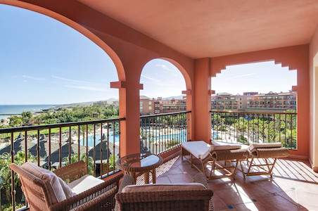 Deluxe guest room terrace with sea and pool views