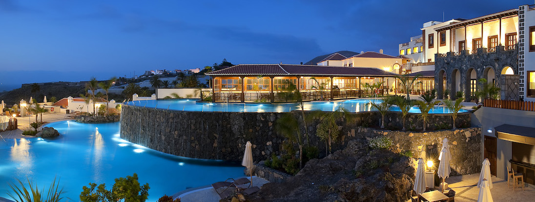 Melia Hacienda del Conde's pool area at night